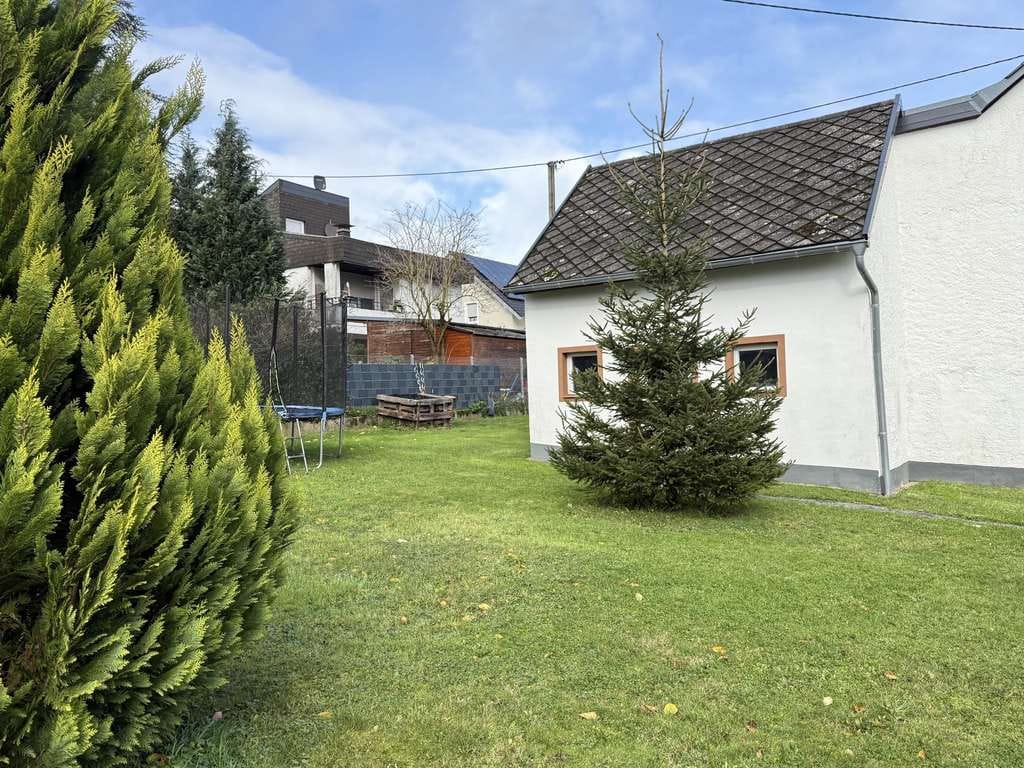 Immobilie in Oberstadtfeld - Gemütliches Einfamilienhaus mit Scheune, Garage und großen Grundstück - Bild 3