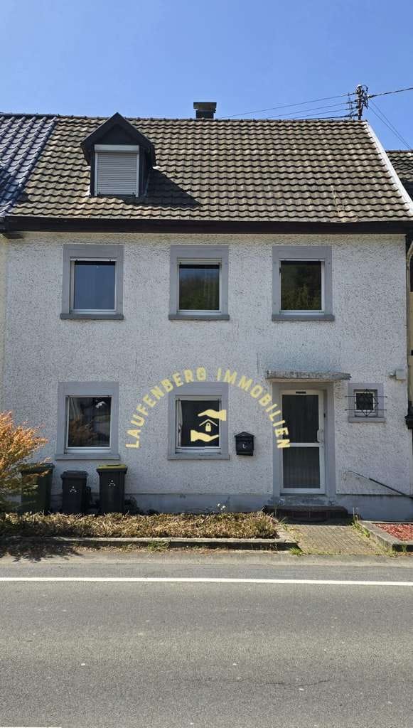 Immobilie in Eitorf - Reihenmittelhaus in Eitorf-Bach – Modernisierungsbedürftig mit Option auf zwei Wohneinheiten - Bild 2