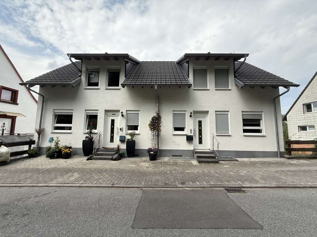 Immobilie in Thaleischweiler-Fröschen - Schöne, neuwertige Doppelhaushälfte in ruhiger Lage zu verkaufen! - Bild 1