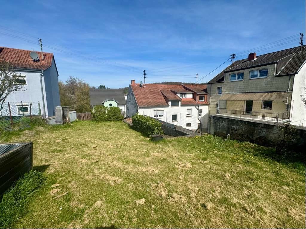 Immobilie in Quierschied - Attraktives 3-Parteienhaus in zentraler Lage von Quierschied - Bild 4