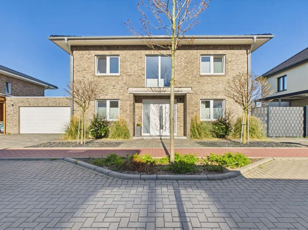 Immobilie in Ostercappeln - Modernes Einfamilienhaus in familienfreundlicher Lage mit Garten & Doppelgarage - Bild 1