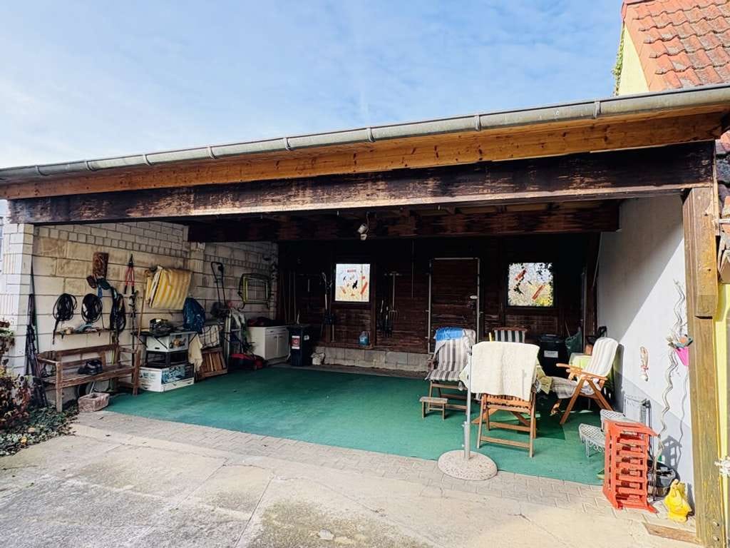 Immobilie in Walzbachtal - Doppelhaushälfte mit Potenzial in ruhiger Lage mit Garten & großem Carport - Bild 2