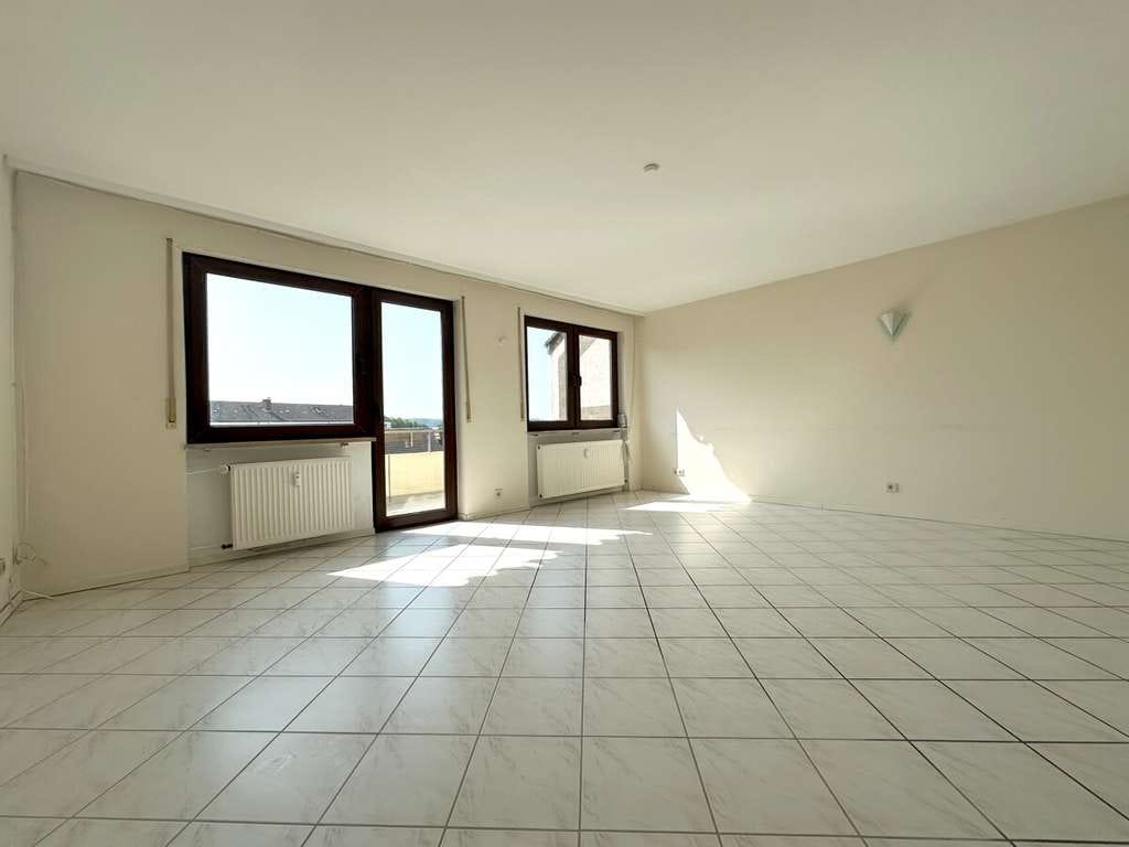 Immobilie in Wörth am Rhein - Helle 3-Zimmer Eigentumswohnung mit Balkon und Stellplatz in attraktiver Lage von Maximiliansau - Bild 1