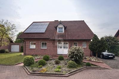Immobilie in Wietmarschen - EINFAMILIENHAUS MIT WINTERGARTEN & PV - Bild 1