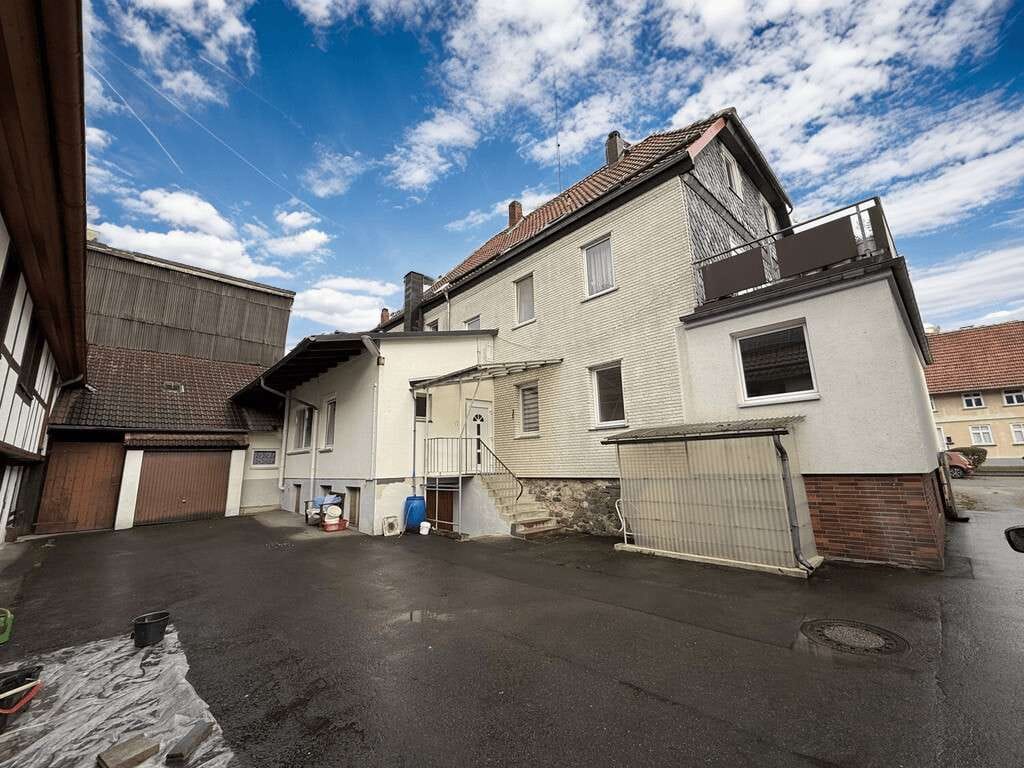 Immobilie in Herzberg am Harz - Vermietetes Mehrfamilienhaus mit Wohn-/Gewerbefläche von ca. 355 m² im Zentrum von Herzberg - Bild 2