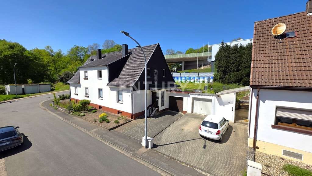 Immobilie in Sulzbach/Saar - Attraktives Familienidyll, Doppelhaushälfte mit Garten und Garage in Sulzbach - Hühnerfeld - Bild 2