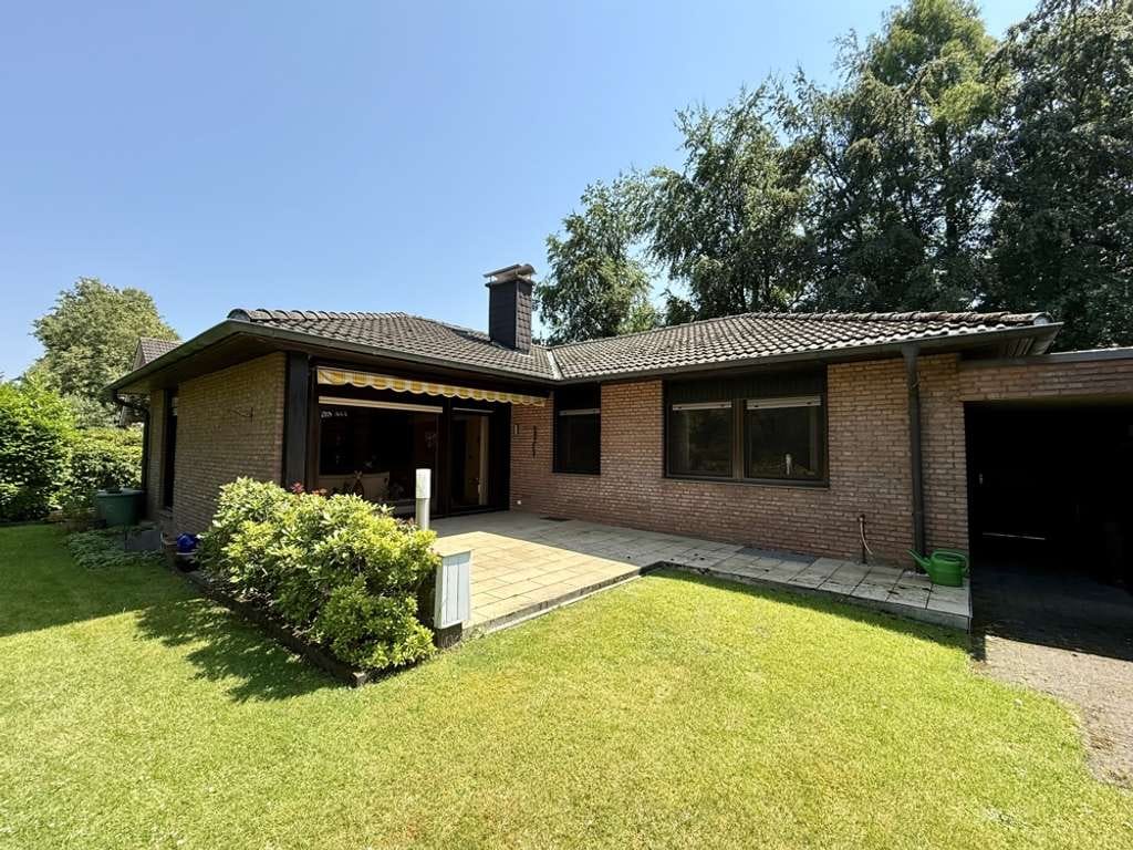 Immobilie in Coesfeld - Bungalow in ruhiger Sackgassenlage mit großem Westgrundstück, Keller und Garage - Bild 0