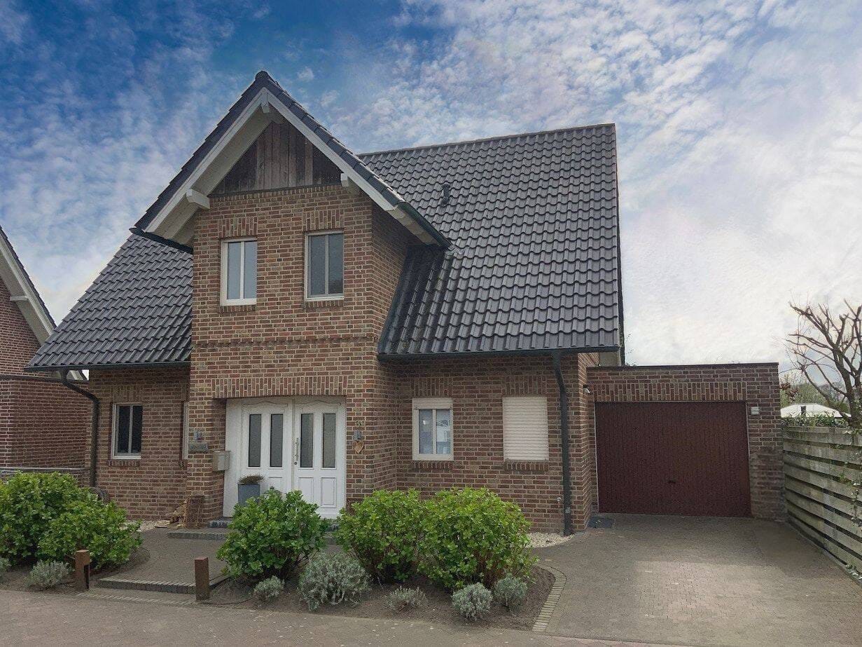 Immobilie in Südlohn - EFH mit Souterrain-Wohnung mit Blick über Wiesen und Felder - Bild 1