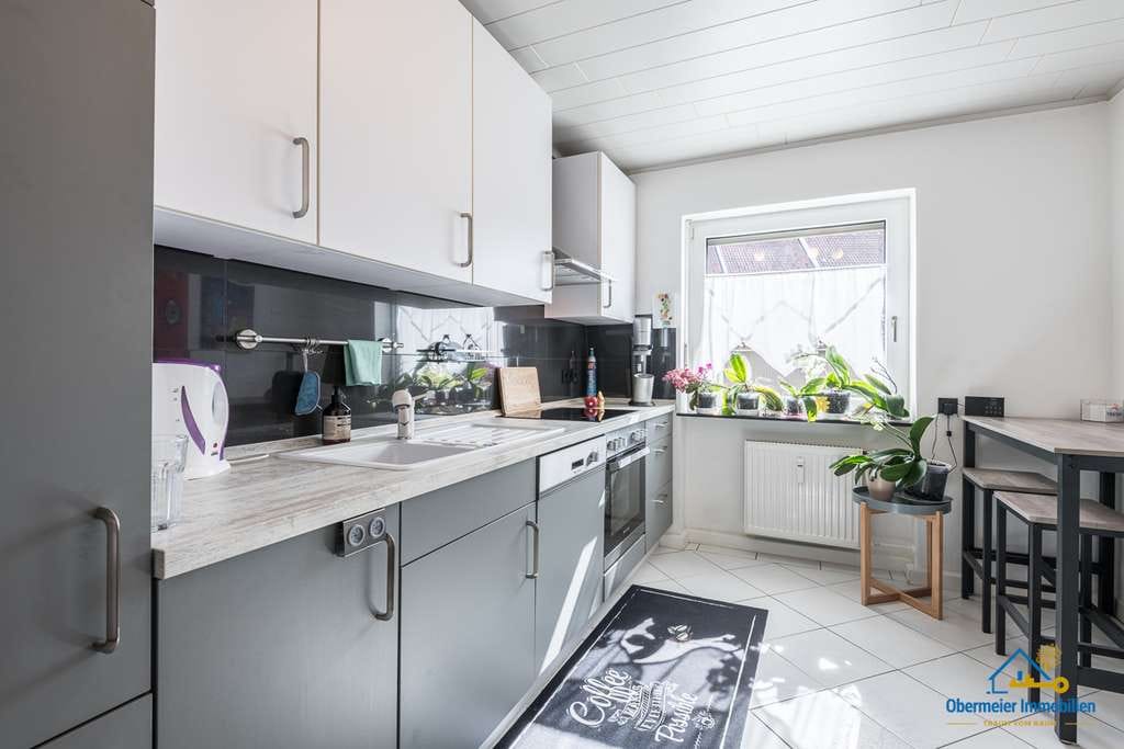 Immobilie in Regenstauf - Stilvolle Erdgeschosswohnung mit Loggia & Garten in ruhiger Lage - Bild 4