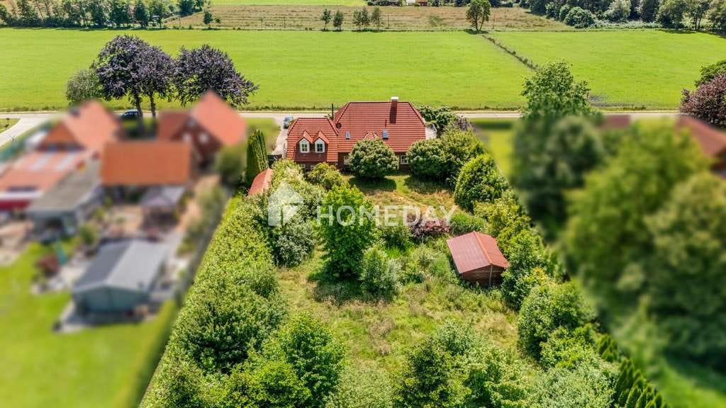 Immobilie in Rechtsupweg - Großzügiges Wohnen mit Einliegerwohnung und traumhaftem Garten in ruhiger Lage - Bild 2