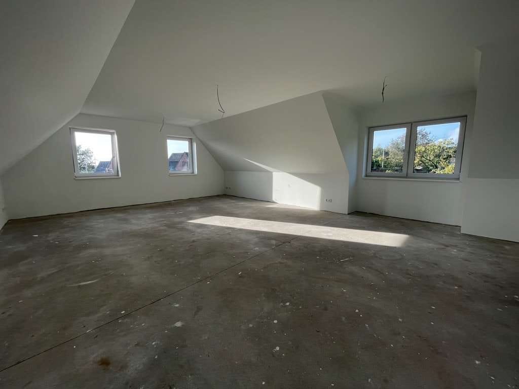 Immobilie in Breklum - ERSTBEZUG: Moderne 2-Zimmer Eigentumswohnung mit PKW-Stellplatz! -beziehen Sie Ihre eigene Etage- - Bild 3