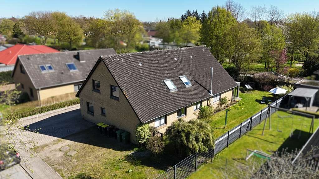 Immobilie in Schafflund - Flexibel nutzbares Zweifamilienhaus – ideal für Mehrgenerationenwohnen oder Vermietung - Bild 1