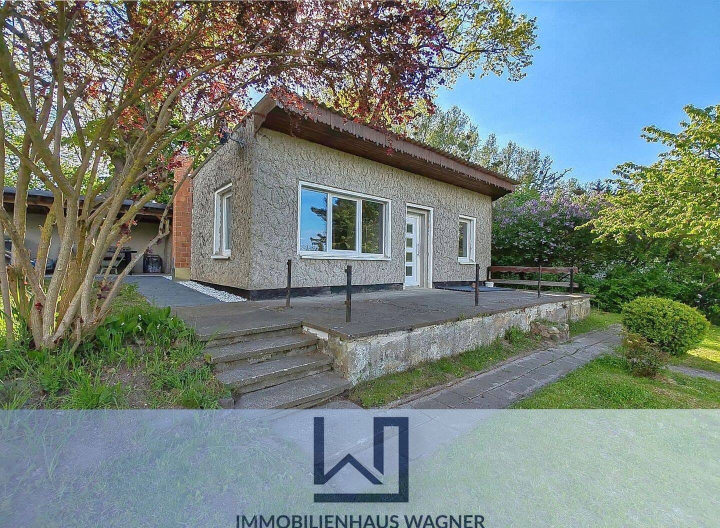 Immobilie in Neverin - Gepflegtes Eigentumsgrundstück mit teilmodernisiertem Bungalow in naturnaher Lage - Bild 0