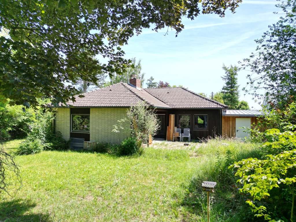 Immobilie in Fronreute - Idyllischer Bungalow in Ortsrandlage mit sehr großem Grundstück und Ausbaupotenzial - Bild 1