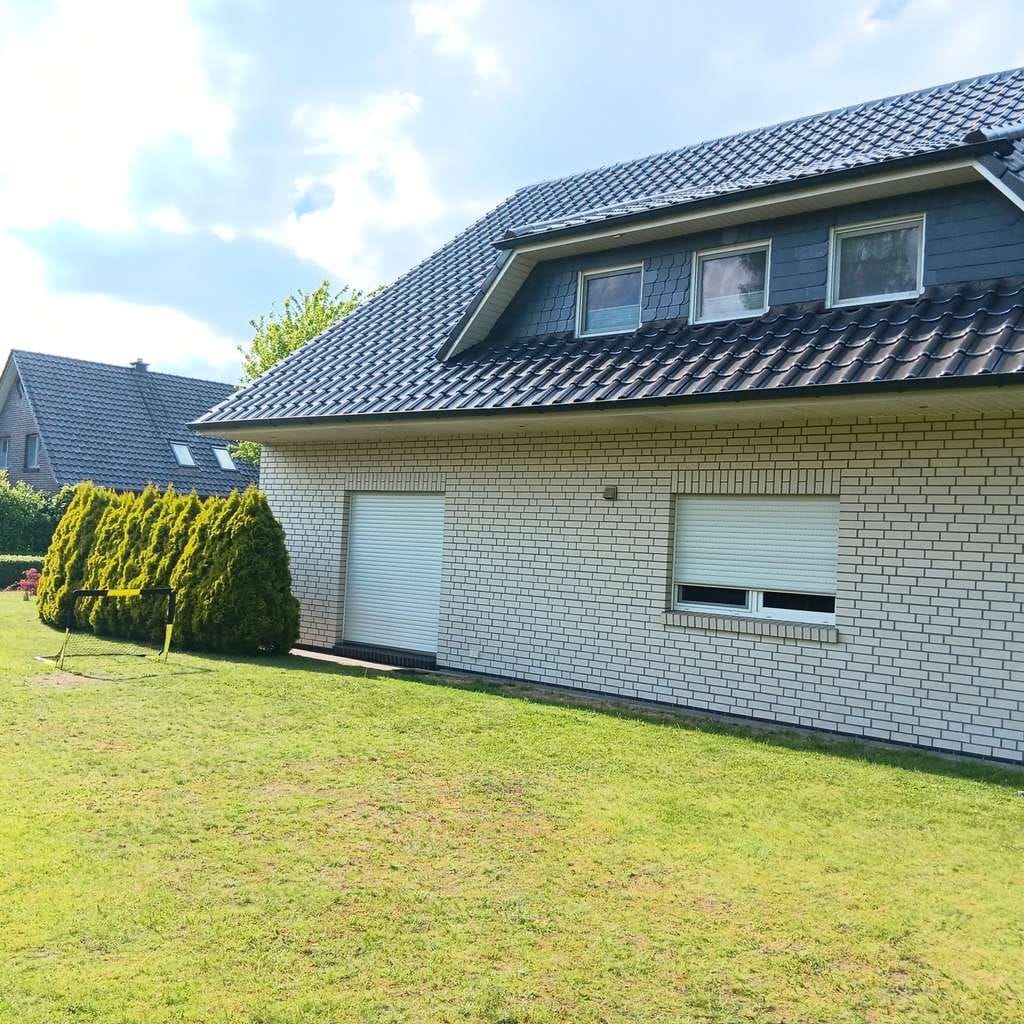 Immobilie in Hatten - Provisionsfrei! Großzügiges Zweifamilienhaus in ruhiger Lage - Bild 2