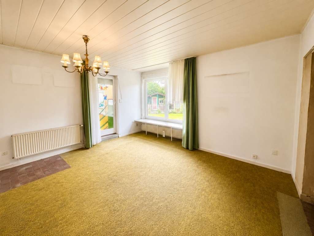 Immobilie in Hambühren - Freistehendes Einfamilienhaus mit großem Grundstück in ruhiger Lage von 29313 Hambühren - Bild 1