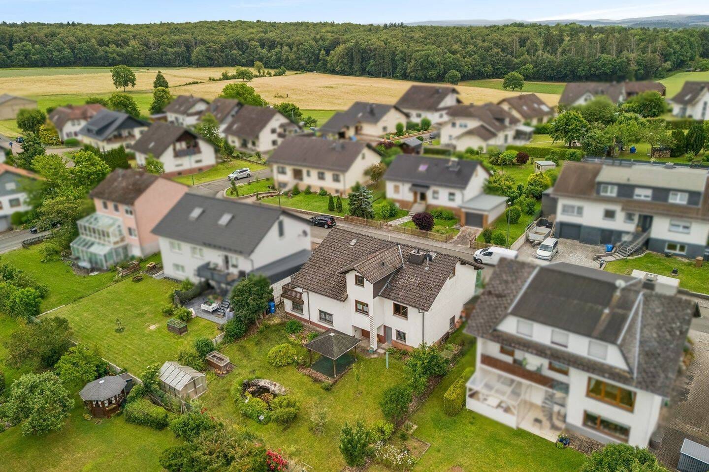 Immobilie in Beselich - Gepflegtes Einfamilienhaus mit Ausbaupotenzial in bevorzugter Wohnlage - Bild 1