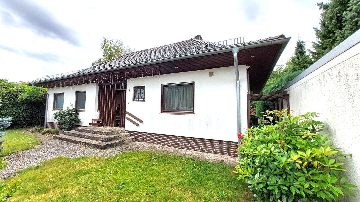 Immobilie in Neuenkirchen - Ein Highlight in Neuenkirchen: Großer Walmdachbungalow - Bild 1