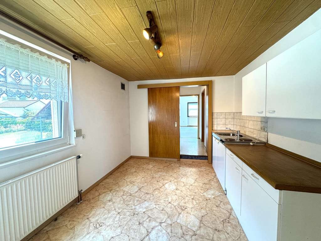 Immobilie in Wurmberg - 2 Familien-Doppelhaushälfte mit Garten und Garage - Bild 1