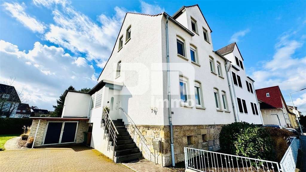 Immobilie in Niestetal - Ein bis Zweifamilienhaus mit 2 Terrassen, Garage und angelegtem Gartenbereich - Bild 1