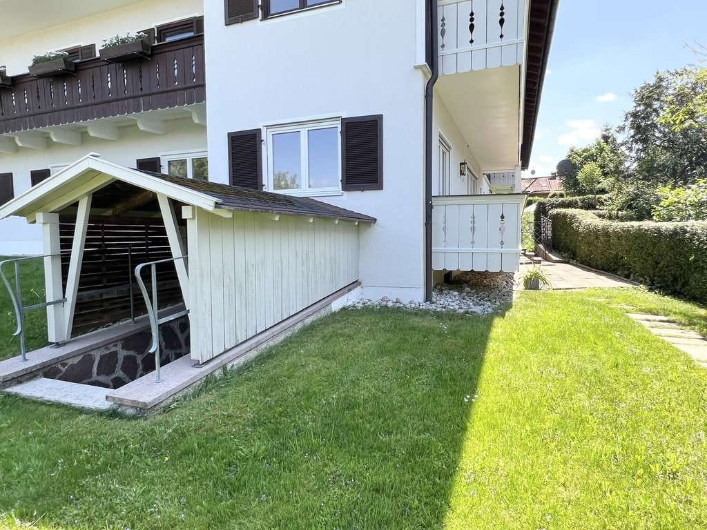 Immobilie in Reichersbeuern - TOP ausgestattete 4-Zimmer-Erdgeschosswohung mit Gartenanteil und Westbalkon! - Bild 2