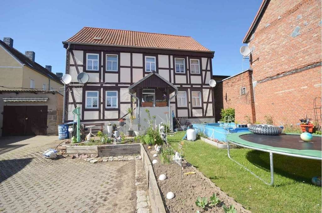 Immobilie in Eilsleben - Historisches Fachwerkhaus mit 3 vermieteten Wohnungen und großem Garten. - Bild 2