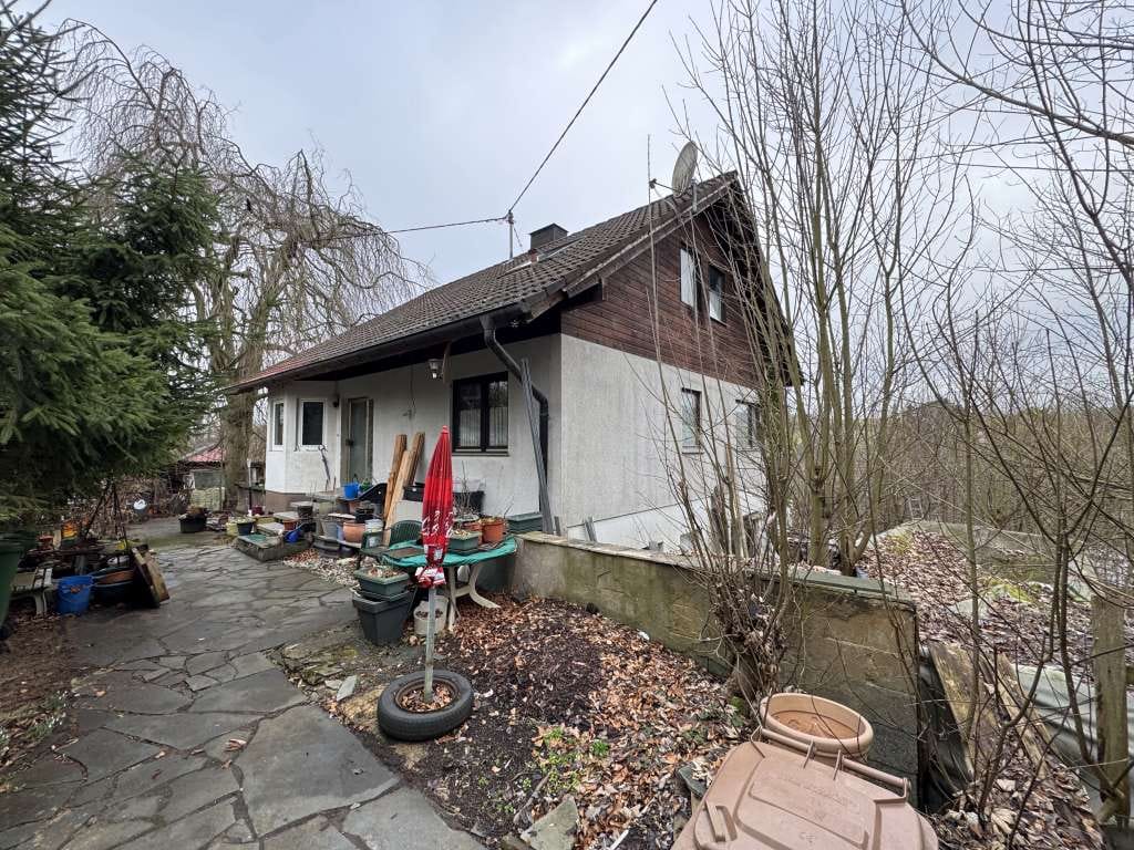 Immobilie in Hattert - Einfamilienhaus mit Einliegerwohnung auf großem Grundstück - Bild 1