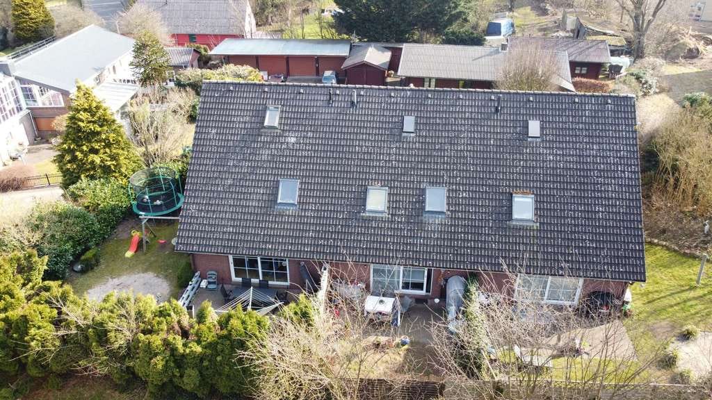 Immobilie in Brekendorf - Attraktives Reihenhaus-Ensemble in Brekendorf mit 2 REH und 1 RMH mit Vierer-Carport - Bild 2