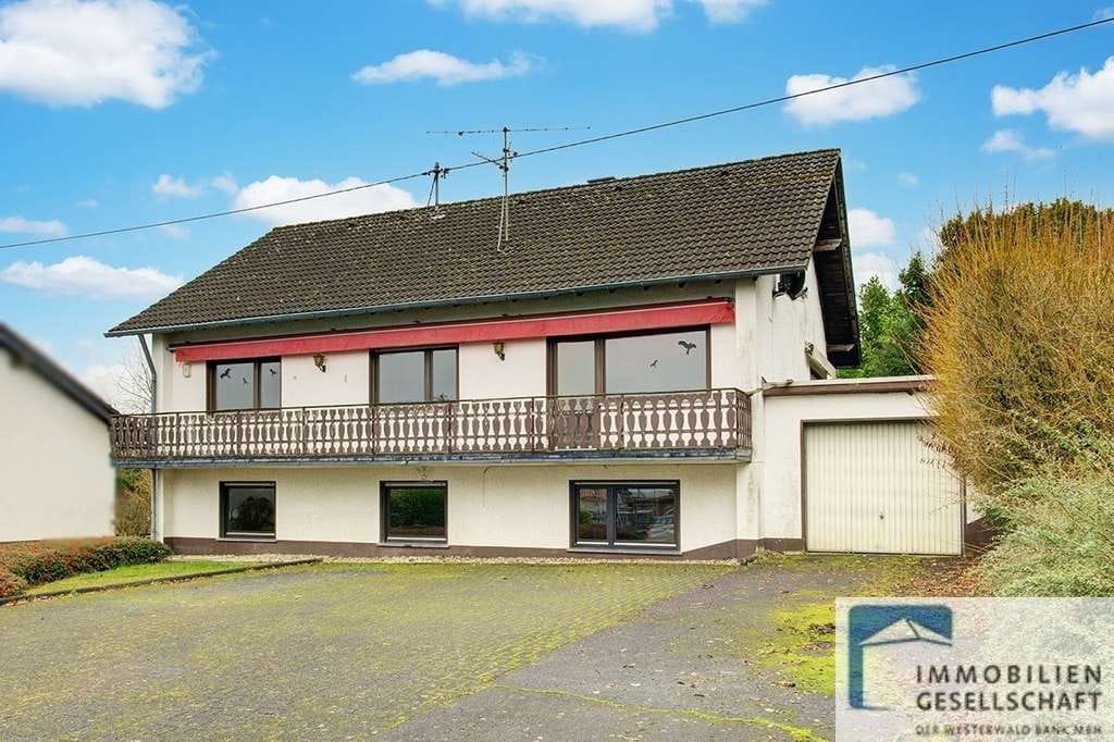 Immobilie in Niederwambach - Großzügiges Zweifamilienhaus mit separater Garage in ruhiger Ortsrandlage! - Bild 0