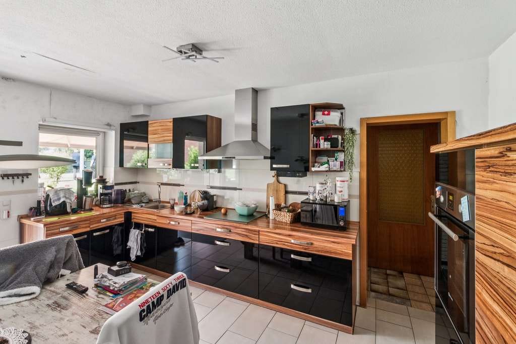 Immobilie in Lüchow - Gepflegtes Zweifamilienhaus mit Garten, Dachterrasse und zwei separaten Eingängen - Bild 3