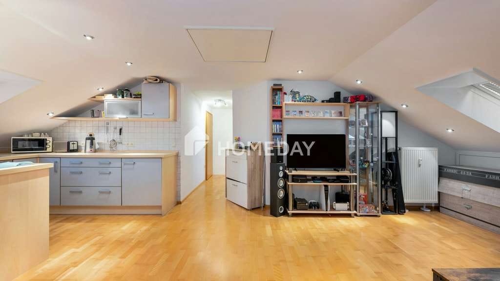 Immobilie in Saal a.d.Donau - Gut vermietete 1,5-Zimmerwohnung mit offenem Wohnkonzept, EBK und Gartenmitnutzung
 - Bild 1