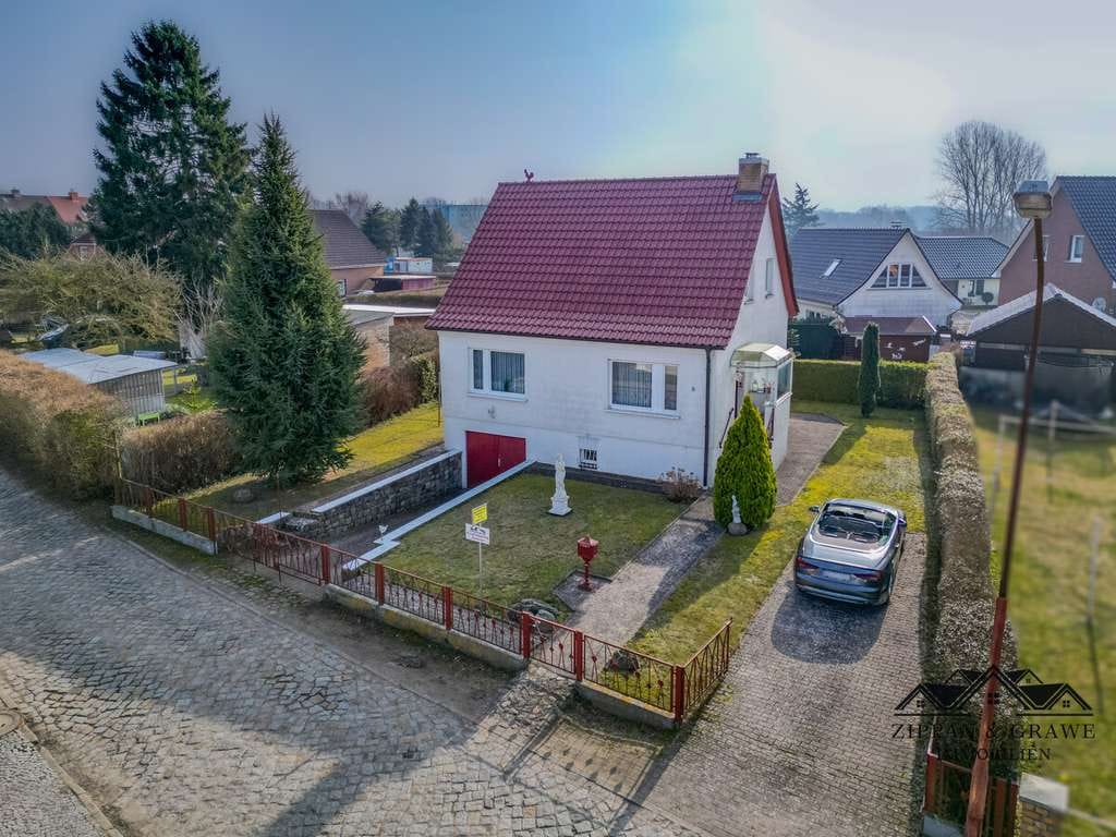 Immobilie in Barth - Wohnen in beliebter Lage - Ihr gepflegtes Einfamilienhaus mit großem Garten und Garage - Bild 1