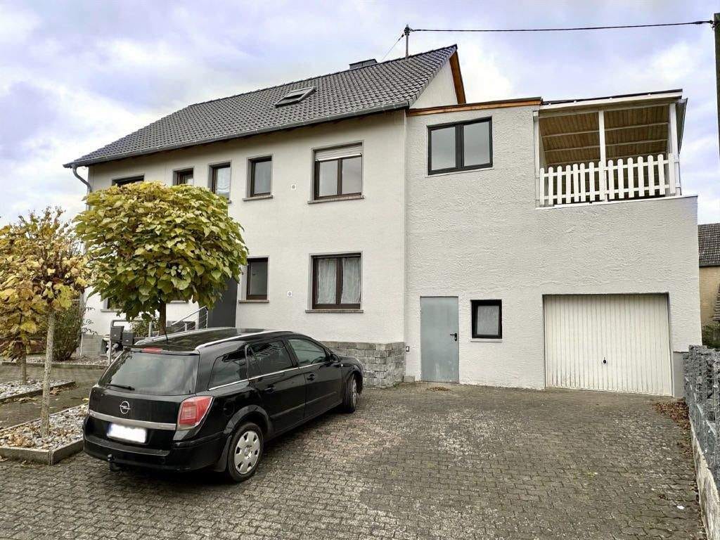Immobilie in Minderlittgen - Dreifamilienhaus mit zusätzlichem Neubaupotenzial - Investieren mit Perspektive! - Bild 1