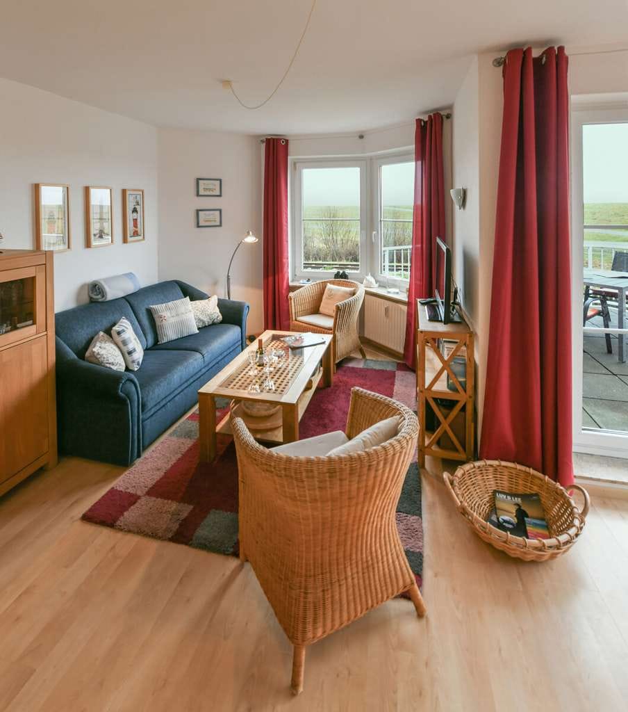 Immobilie in Wangerooge - Sonnige Ferienimmobilie mit Südbalkon und Deichblick - Bild 1