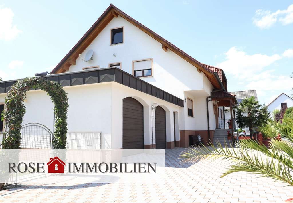 Immobilie in Rheinau - Ruhig gelegenes Mehrgenerationenhaus mit Garten und Vermietungsmöglichkeit - Bild 0