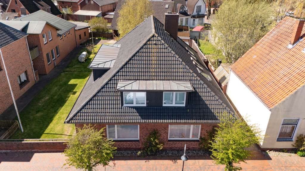 Immobilie in Groven - Solides Mehrfamilienhaus mit vier vermieteten Wohneinheiten in Lunden - Bild 2