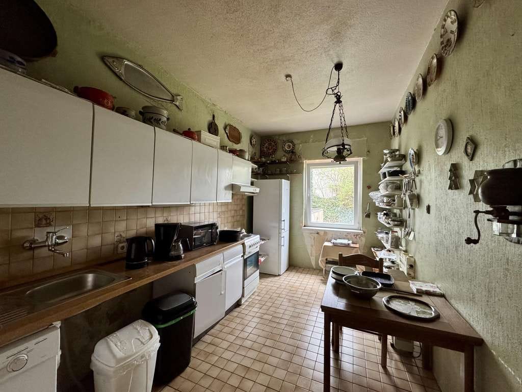 Immobilie in Düsseldorf - Mehrfamilienhaus mit Potenzial in Düsseldorf- Holthausen - Bild 2