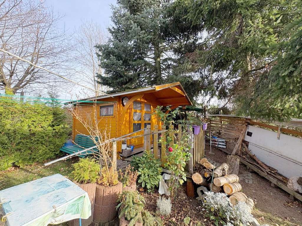 Immobilie in Bobritzsch-Hilbersdorf - Attraktive Kapitalanlage im Grünen – Vermietetes Holzhaus mit großem Grundstück - Bild 1