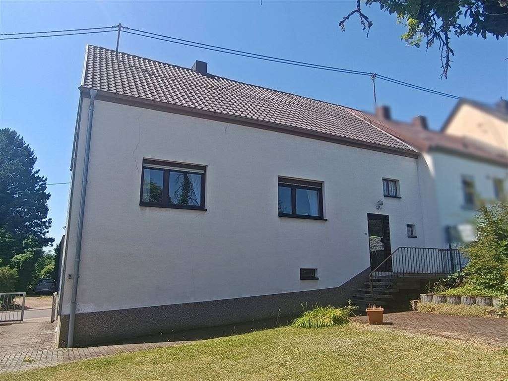 Immobilie in Merchweiler - Einseitig angebautes Einfamilienhaus mit schönem Grundstück - Bild 3