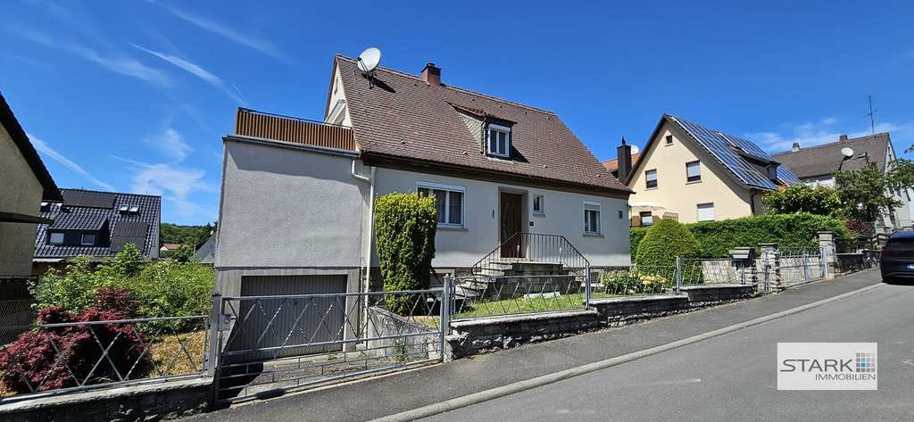 Immobilie in Kleinrinderfeld - Familienfreundliches Zuhause mit Garten, Dachterrasse und Garage in ruhiger Lage - Bild 1