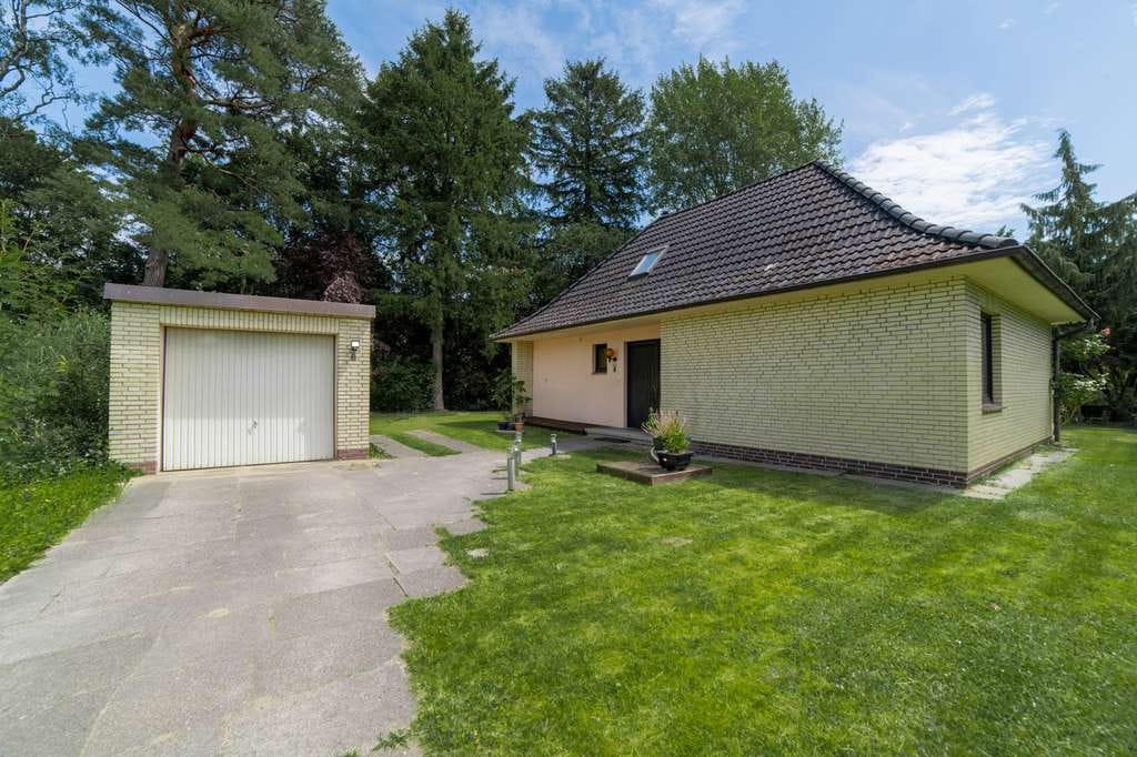 Immobilie in Ellerbek - Charmantes Einfamilienhaus mit Modernisierungspotenzial in idyllischer Lage in Ellerbek - Bild 1