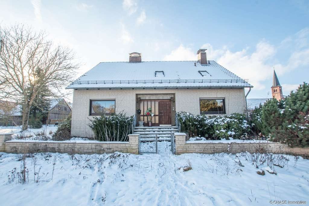 Immobilie in Rollshausen - Hochwertiges Architekten-Ein-/Zweifamilienhaus mit Garten und Garagen - TOP-Wohnen in Rollshausen! - Bild 1