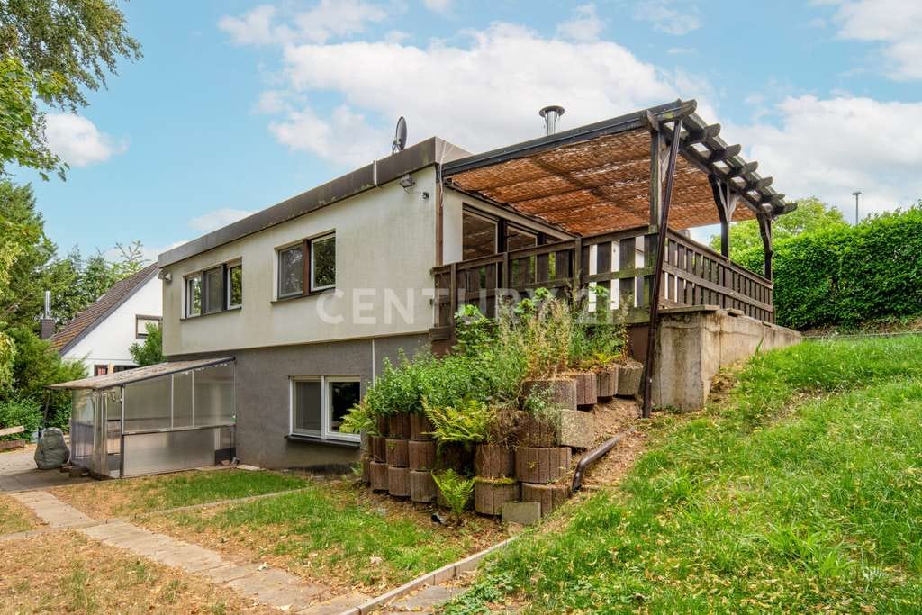 Immobilie in Hünstetten - Bezugsfei | Bungalow | Moderne exklusive Küche | Unverbaubare ruhige Lage | Doppelgarage - Bild 1