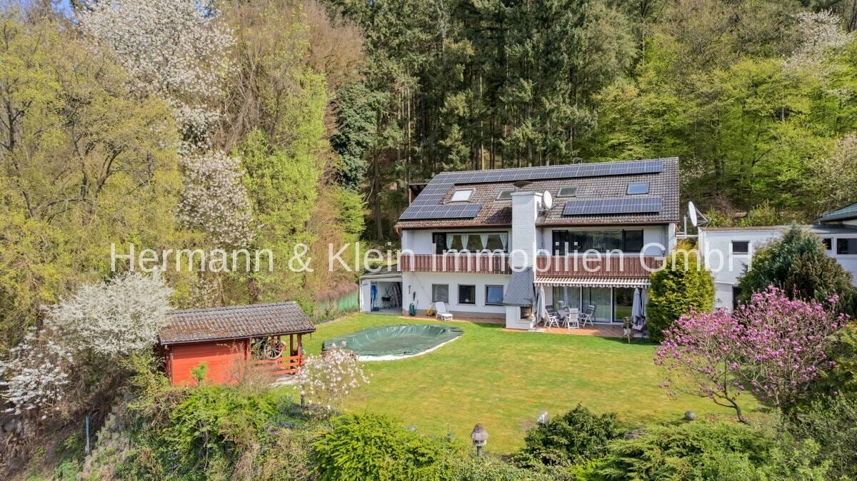 Immobilie in Eppstein - Attraktives Mehrfamilienhaus mit 5 Wohneinheiten, Pool, Kamin, Sauna & großem Grundstück - Bild 1
