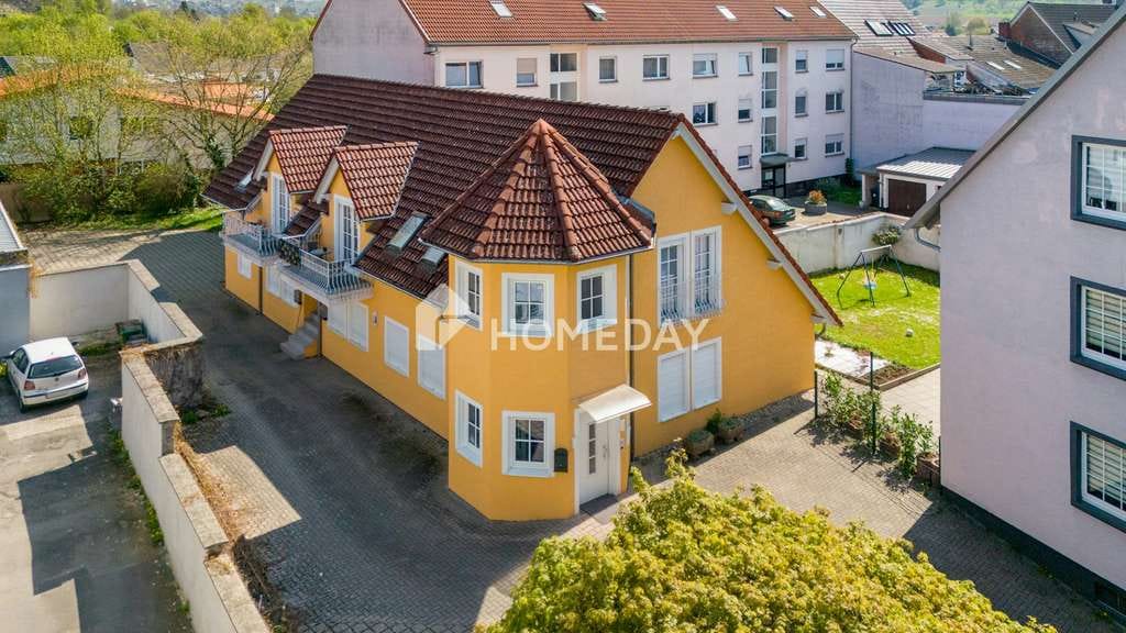 Immobilie in Eschelbronn - Voll vermietetes Weberhaus mit Praxis, 3 Balkonen und neuer Heizung in Eschelbronn - Bild 2