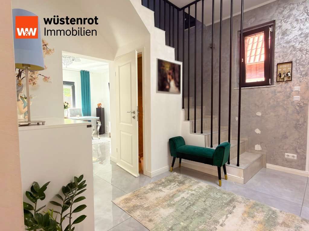 Immobilie in Ennigerloh - Einziehen & Wohlfühlen! Saniertes Familienjuwel mit Kamin, Wintergarten & XXL-Garten - Bild 2