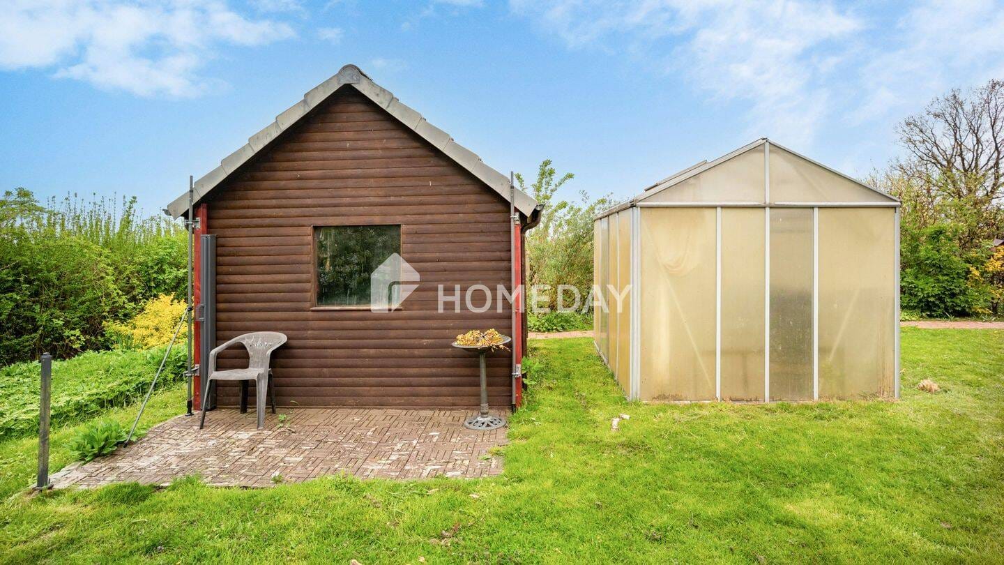 Immobilie in Börgerende-Rethwisch - Zweifamilienhaus mit ca. 300 m² Wohnfläche, Gartenidylle und vielseitigen Nutzungsmöglichkeiten - Bild 3