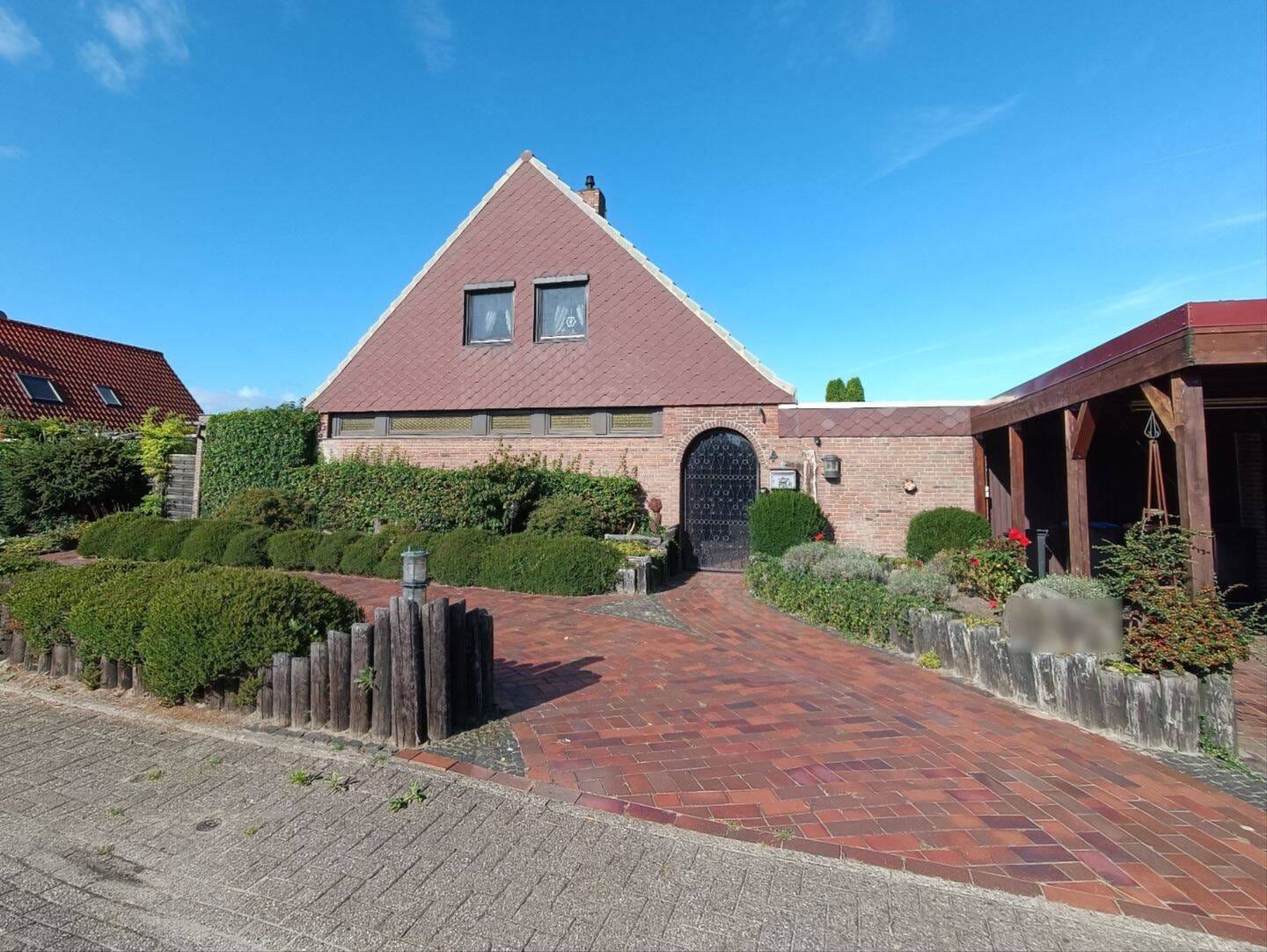 Immobilie in Zetel - Gemütliches Einfamilienhaus mit kleinem Wintergarten in ruhiger Wohnlage von Zetel-Neuenburg - Bild 0