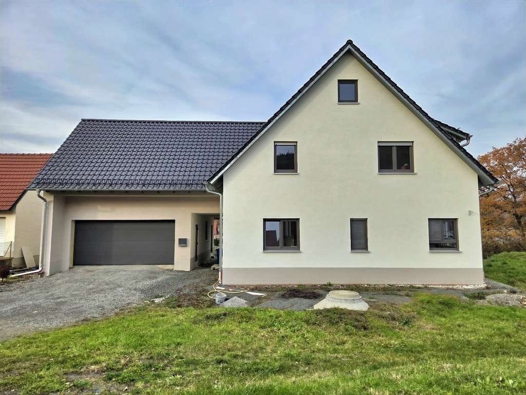 Immobilie in Rauhenebrach - Junges und großes EFH in ruhiger, sonniger Siedlungslage (Wfl. 220 m² / Grund 949 m²) mit Doppelg - Bild 3