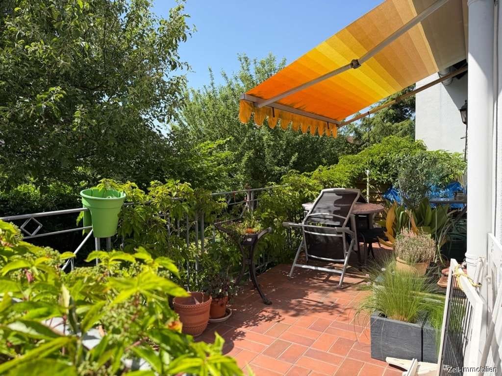 Immobilie in Geisenheim - Freistehendes Einfamilienhaus mit schön angelegtem Grundstück und Garage - Bild 2